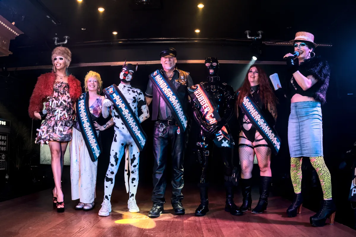 Irony, Spyke, Master Blackkrest, Zen and Cami on stage with their sashes